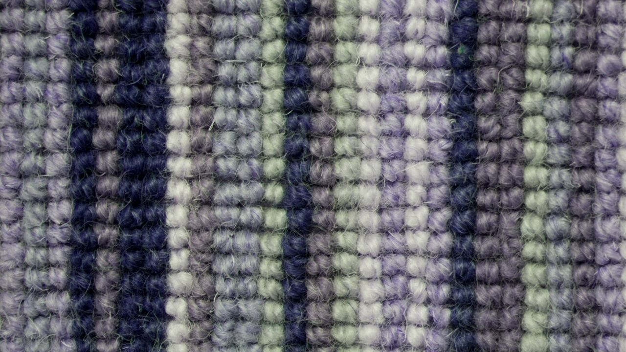 Natural wool carpet fibers